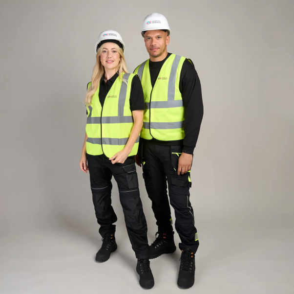 What to Know Before Branding Hi-Vis and PPE 1 Man and woman wearing branded hi-vis jackets and hard hats