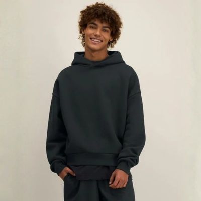 Stanley/Stella Sculpter Heavyweight Hoodie 5 male wearing Stanley/Stella heavyweight hoodie