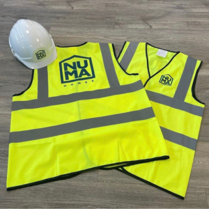 What to Know Before Branding Hi-Vis and PPE 4 printed hi-vis vests with a branded hard hat