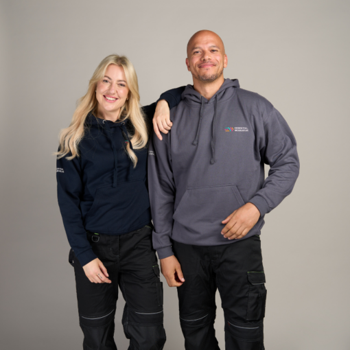 male and female model wearing essential workwear branded hoodies