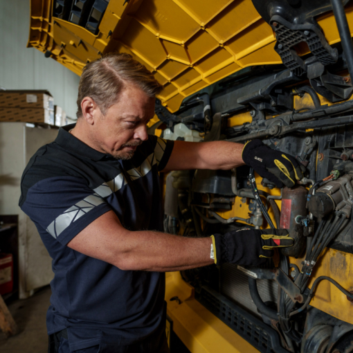 mechanic working in branded workwear