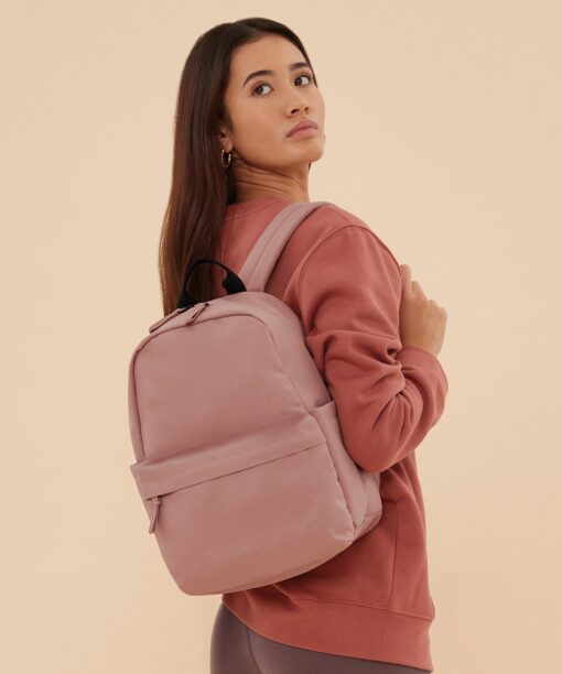 A girl wearing a backpack