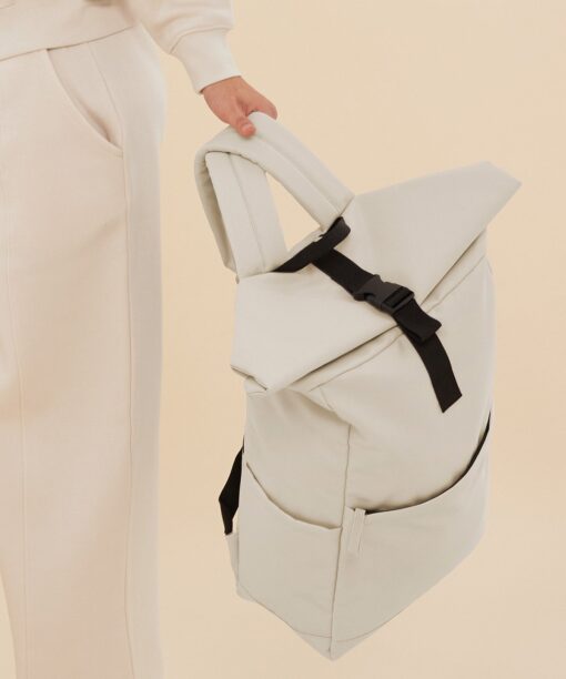 A hand holding a bag